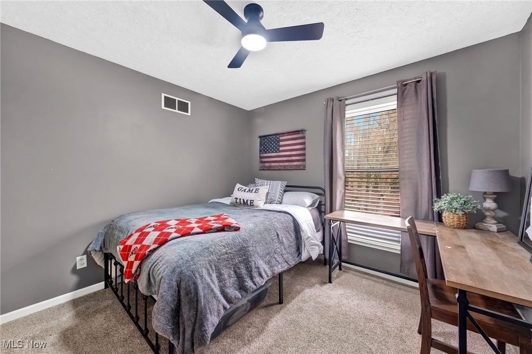 1247 Derbydale Road Akron, OH 44306 - Photo 24 of 45 Bedroom featuring ceiling fan and carpet