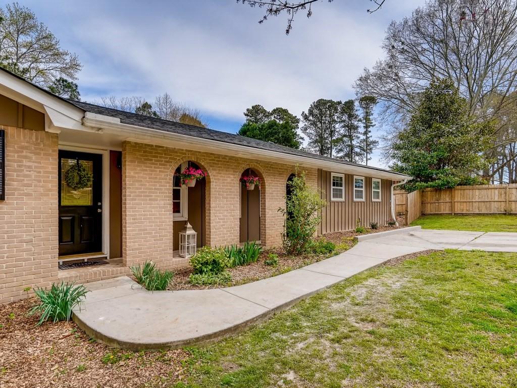 1772 Pounds Road Southwest Stone Mountain, GA 30087 - Photo 1 of 1 Charming mid-century ranch with owner's suite addition!