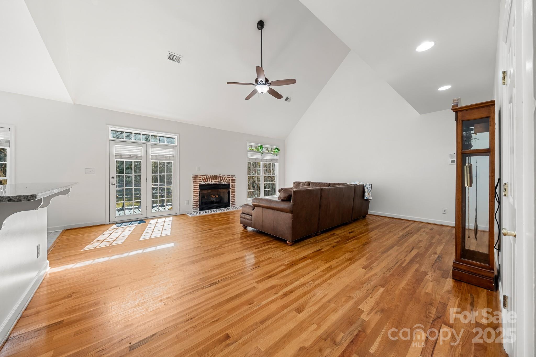 1713 Oak Park Court Iron Station, NC 28080 - Photo 13 of 39 a spacious bedroom with a bed and a flat screen tv