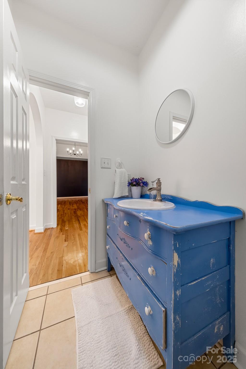 1713 Oak Park Court Iron Station, NC 28080 - Photo 15 of 39 a room with a bed and a mirror