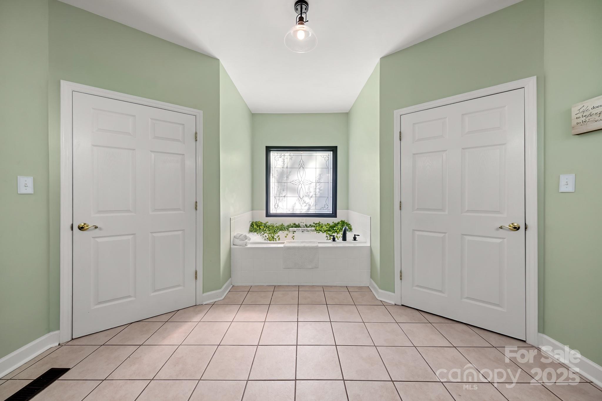 1713 Oak Park Court Iron Station, NC 28080 - Photo 24 of 39 a view of an entryway and a window in a room