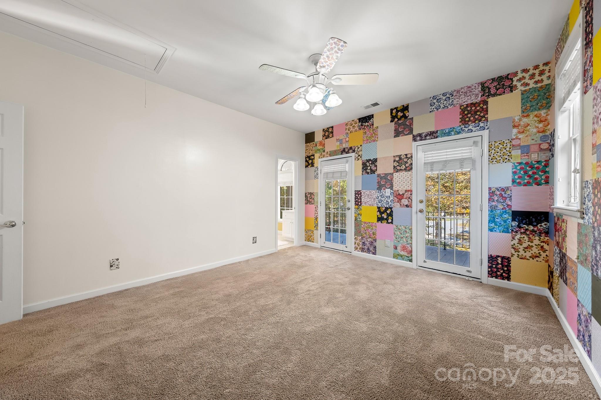 1713 Oak Park Court Iron Station, NC 28080 - Photo 32 of 39 a view of a hallway with furniture and a chandelier
