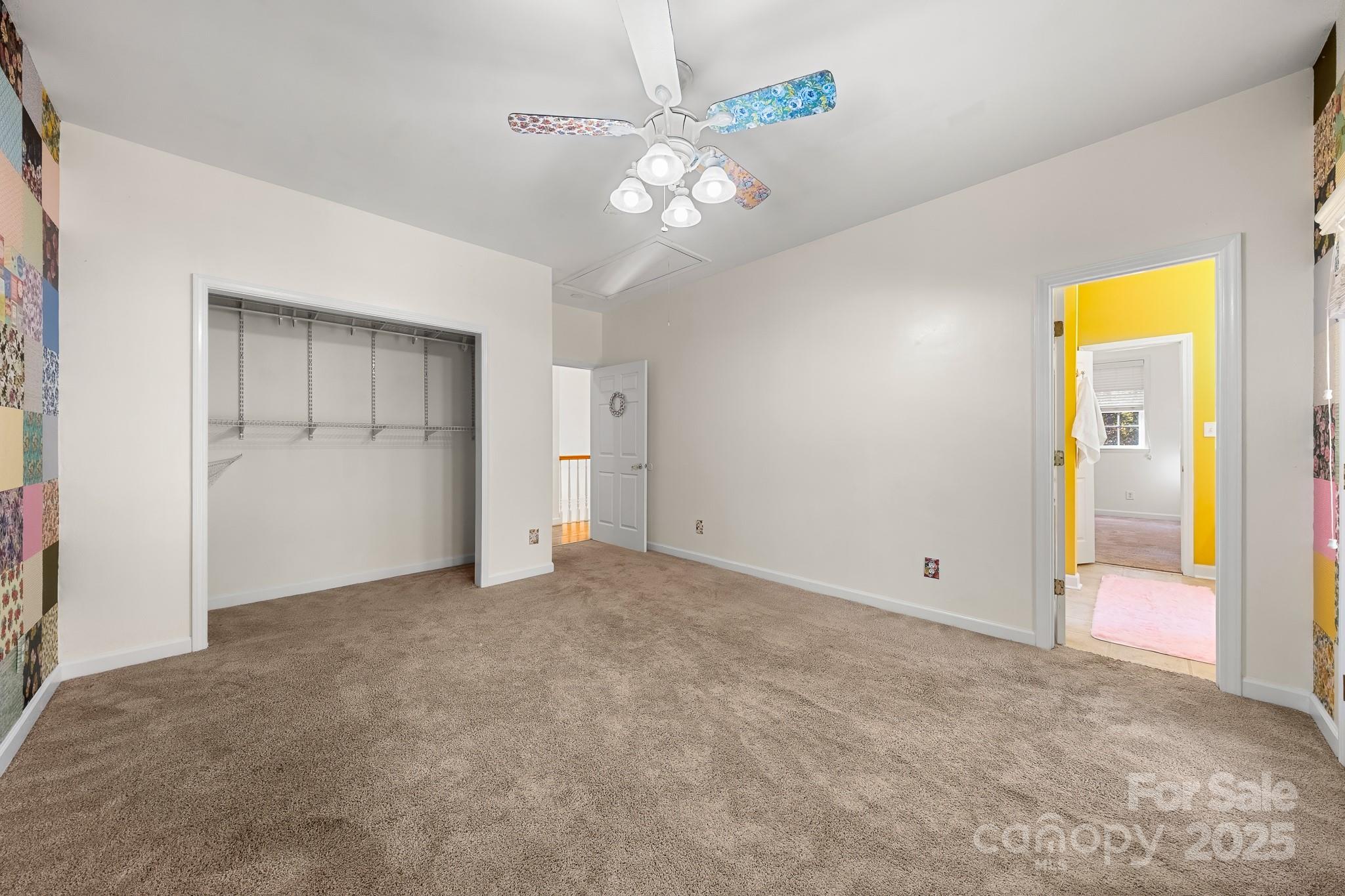 1713 Oak Park Court Iron Station, NC 28080 - Photo 33 of 39 a view of an empty room with a ceiling fan