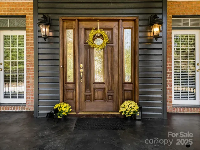 a front view of a house with patio
