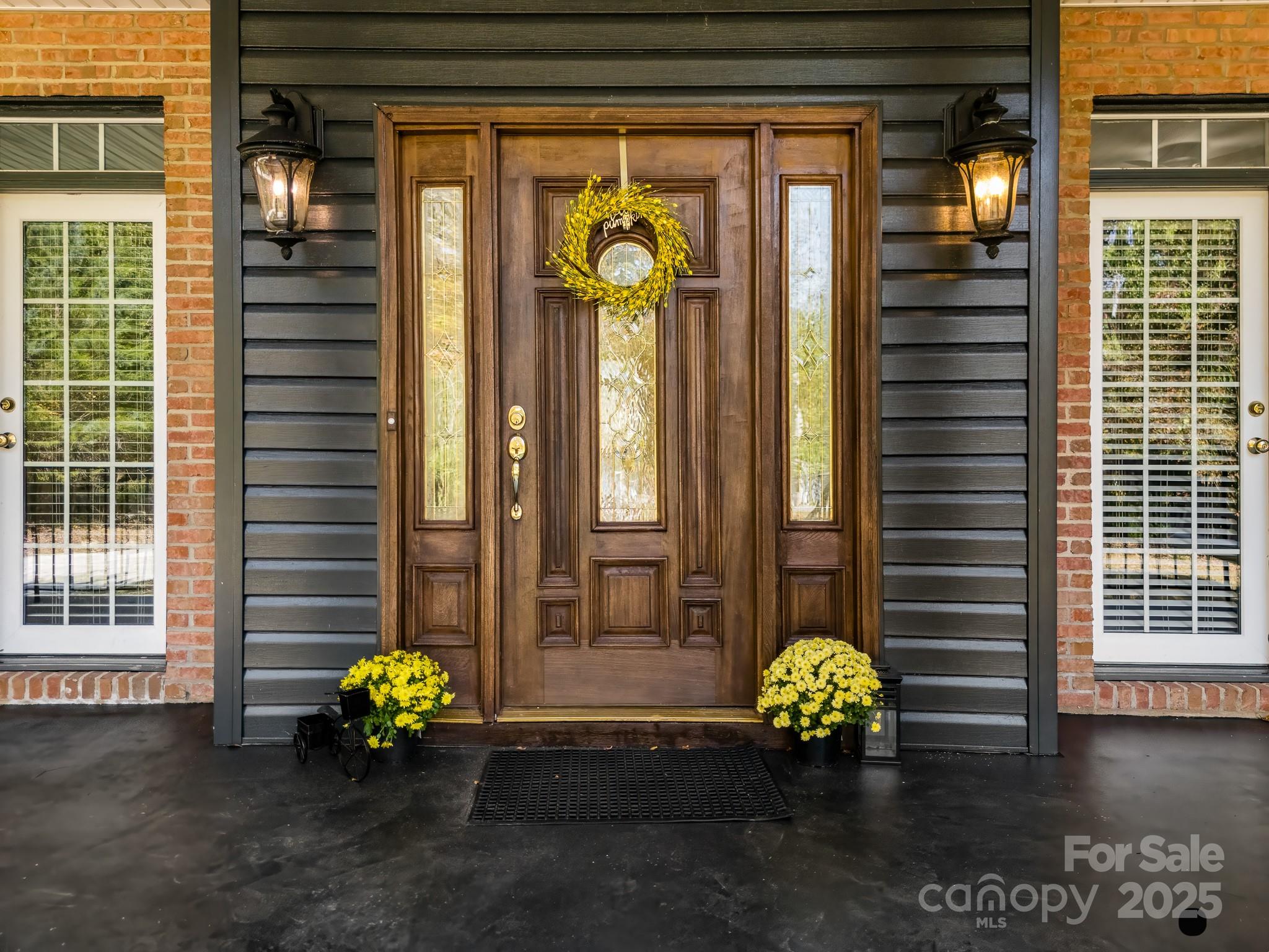 1713 Oak Park Court Iron Station, NC 28080 - Photo 4 of 39 a front view of a house with patio