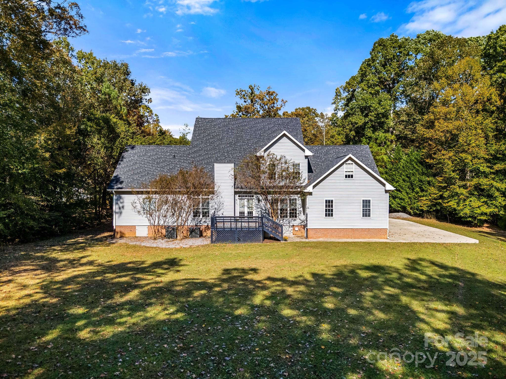 1713 Oak Park Court Iron Station, NC 28080 - Photo 7 of 39 a view of a house with a yard