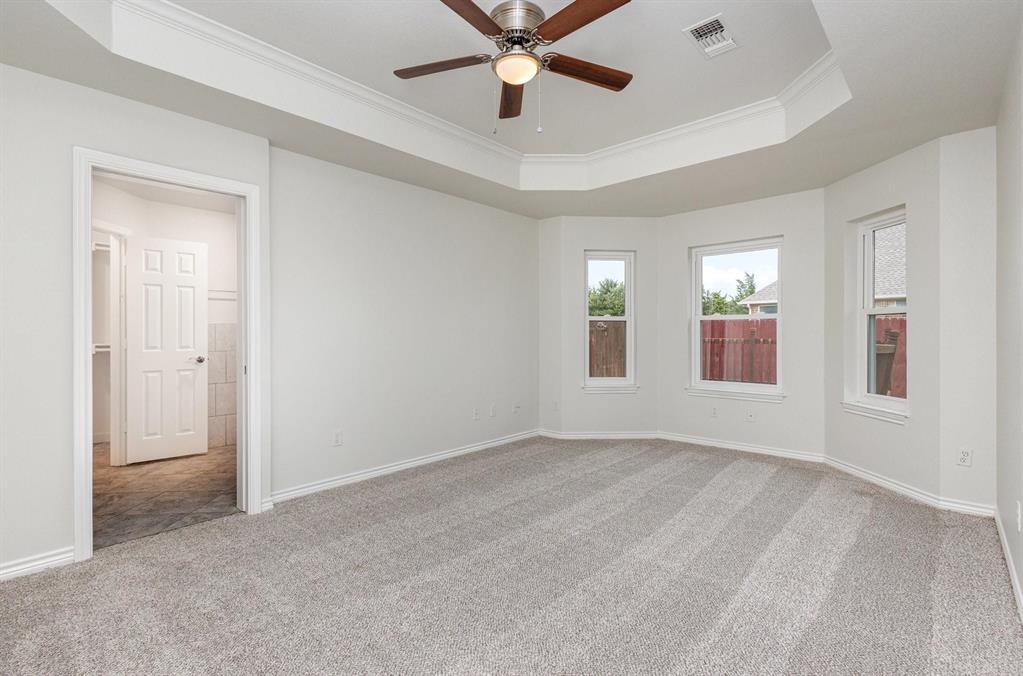 3961 Joe Wilson Road Midlothian, TX 76065 - Photo 16 of 27 an empty room with fan and windows