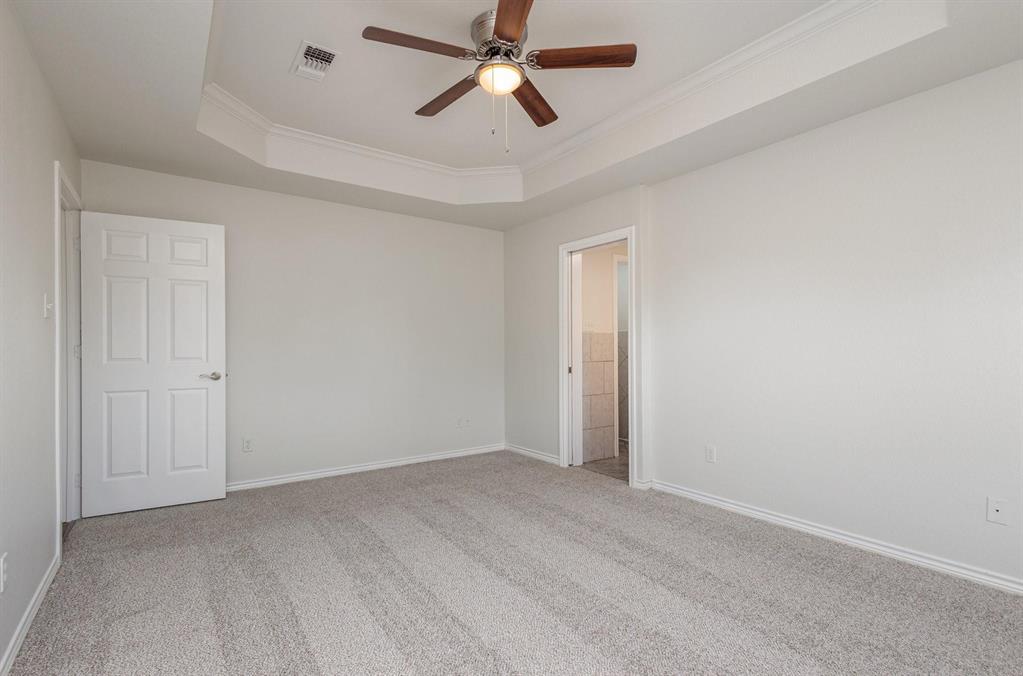 3961 Joe Wilson Road Midlothian, TX 76065 - Photo 17 of 27 an empty room with chandelier fan