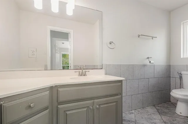 a bathroom with a sink and a toilet