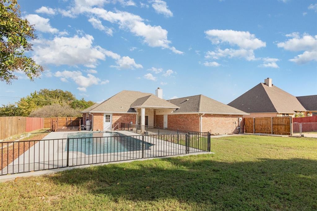 3961 Joe Wilson Road Midlothian, TX 76065 - Photo 25 of 27 a view of a house with a yard and sitting area