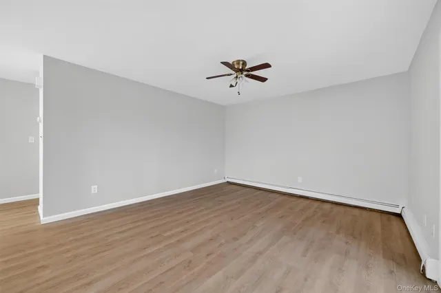 a view of room with hardwood floor