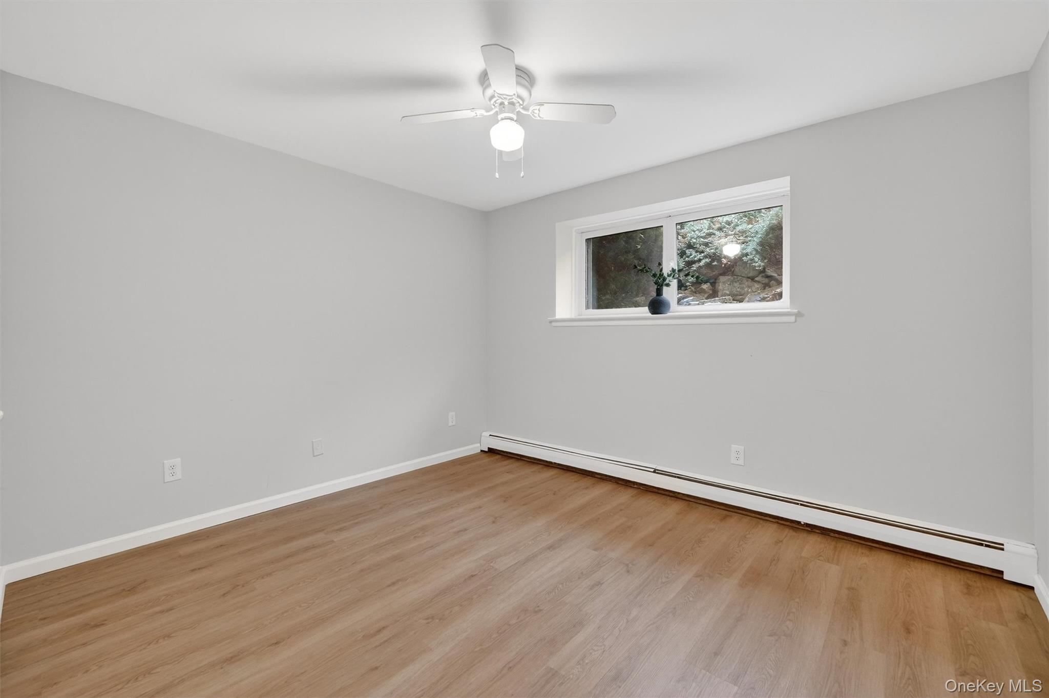 14 Scenic Drive, Unit 14T Croton-on-Hudson, NY 10520 - Photo 21 of 29 wooden floor in an empty room