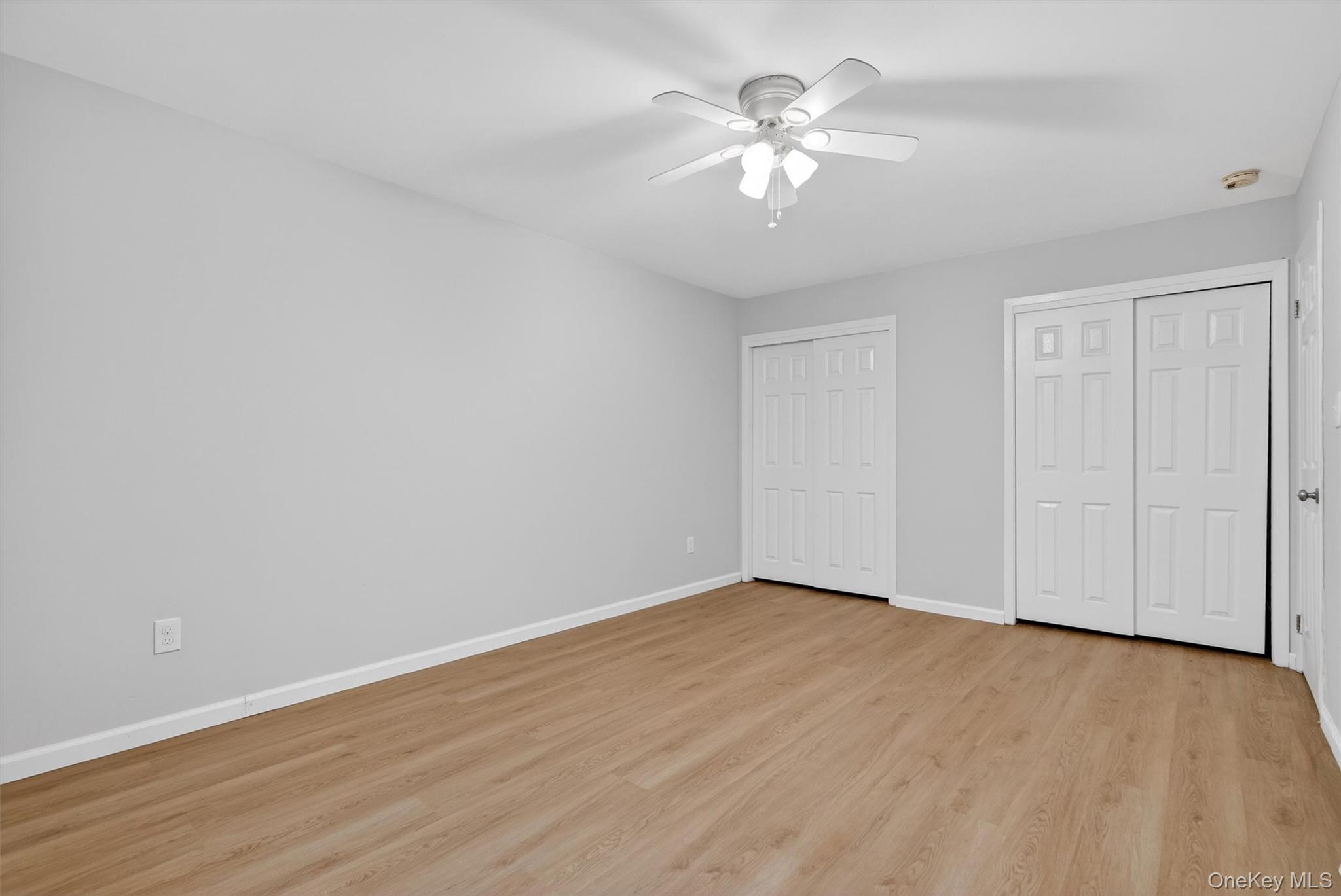 14 Scenic Drive, Unit 14T Croton-on-Hudson, NY 10520 - Photo 24 of 29 a view of an empty room with wooden floor