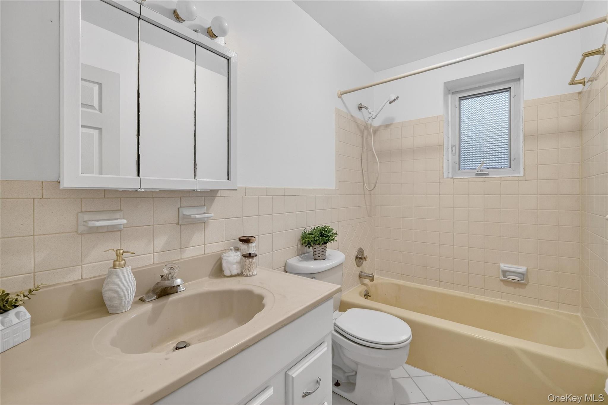 14 Scenic Drive, Unit 14T Croton-on-Hudson, NY 10520 - Photo 25 of 29 a bathroom with a sink toilet tub and shower