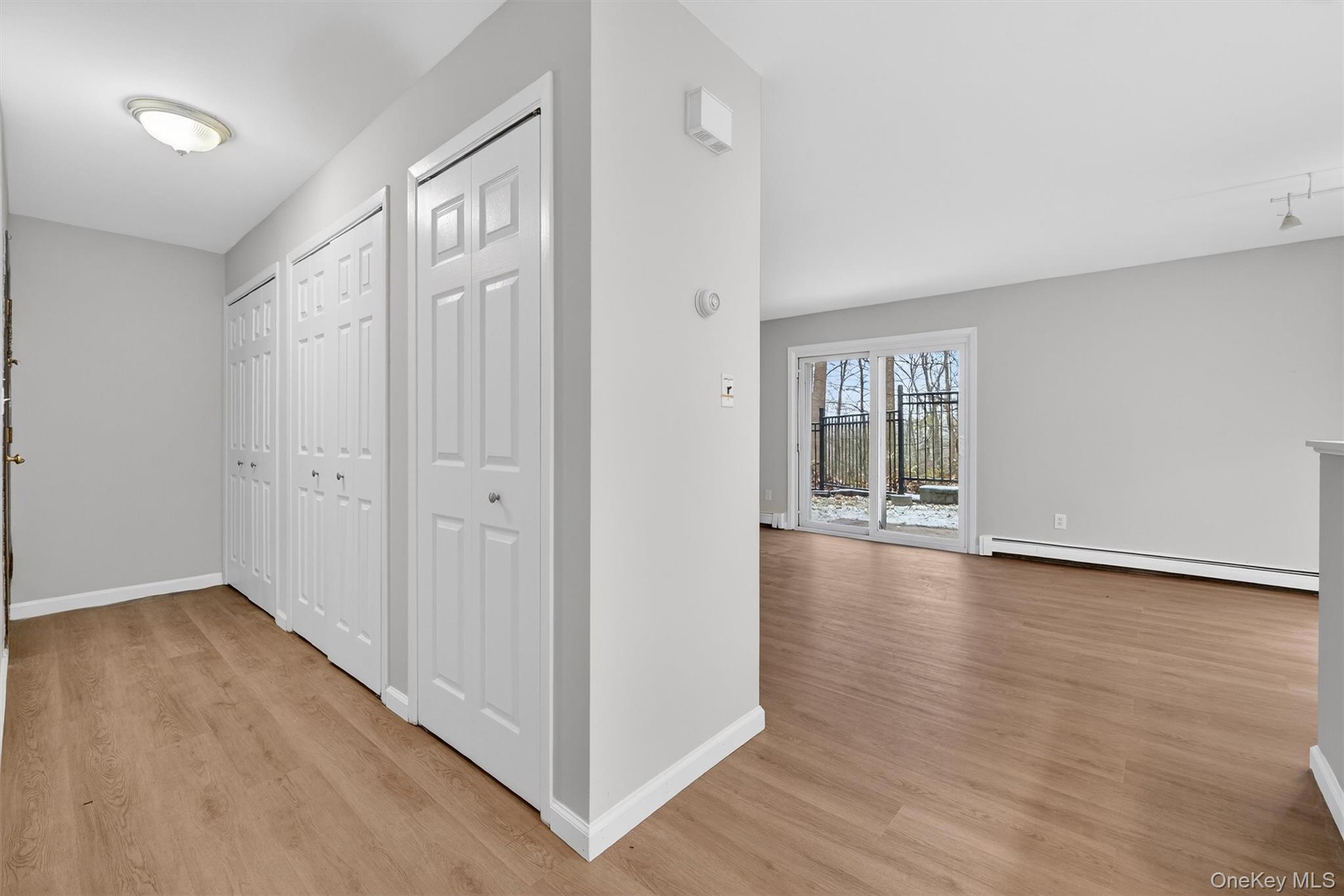 14 Scenic Drive, Unit 14T Croton-on-Hudson, NY 10520 - Photo 3 of 29 a view of livingroom with hardwood floor and window