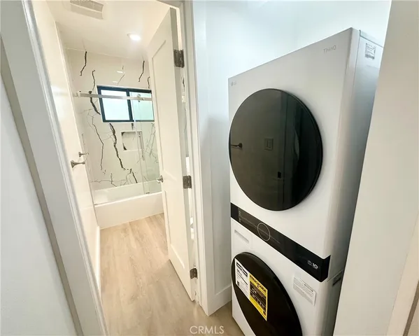 a bathroom with a sink and shower