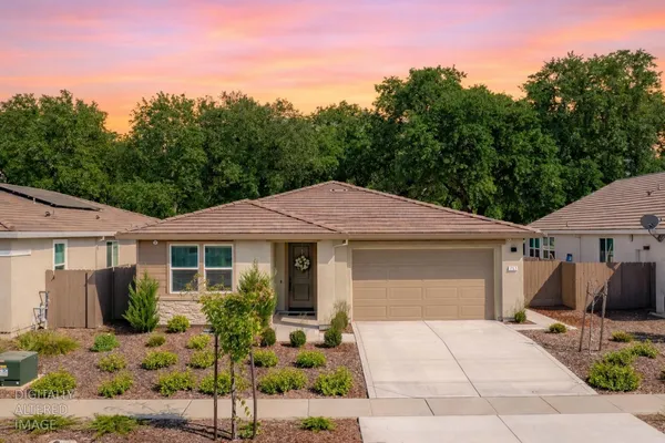 a view of a house with a patio