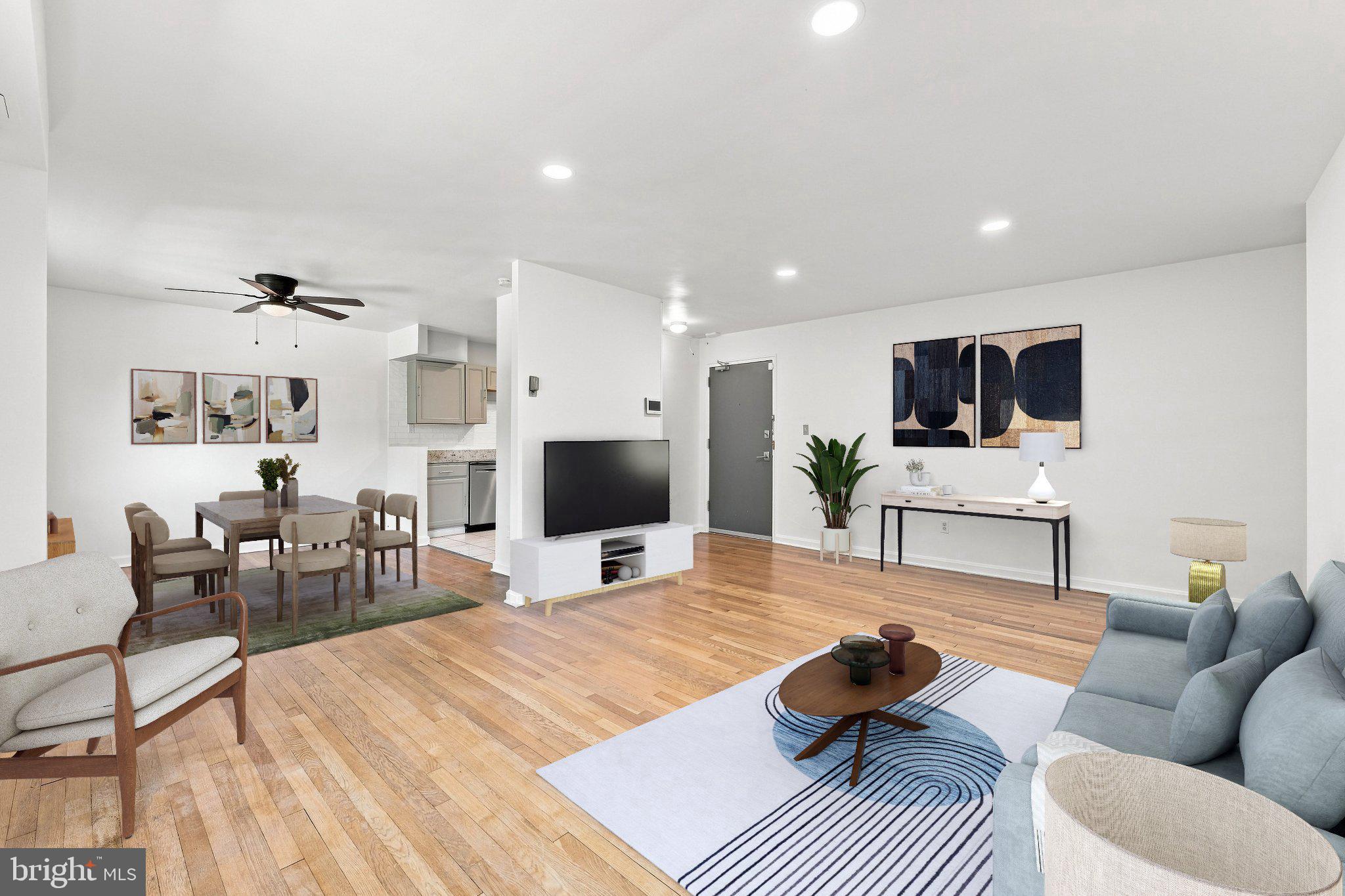 95 East Wayne Avenue, Unit 212 Silver Spring, MD 20901 - Photo 1 of 30 Living room and dining area (virtually staged)