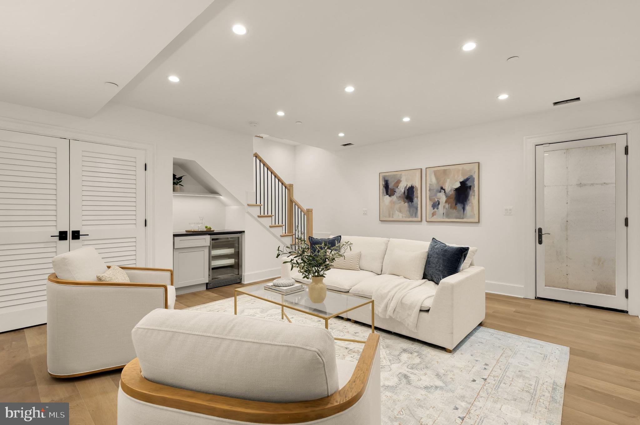 1249 4th Street Northwest Washington, DC 20001 - Photo 23 of 32 a living room with furniture and a wooden floor