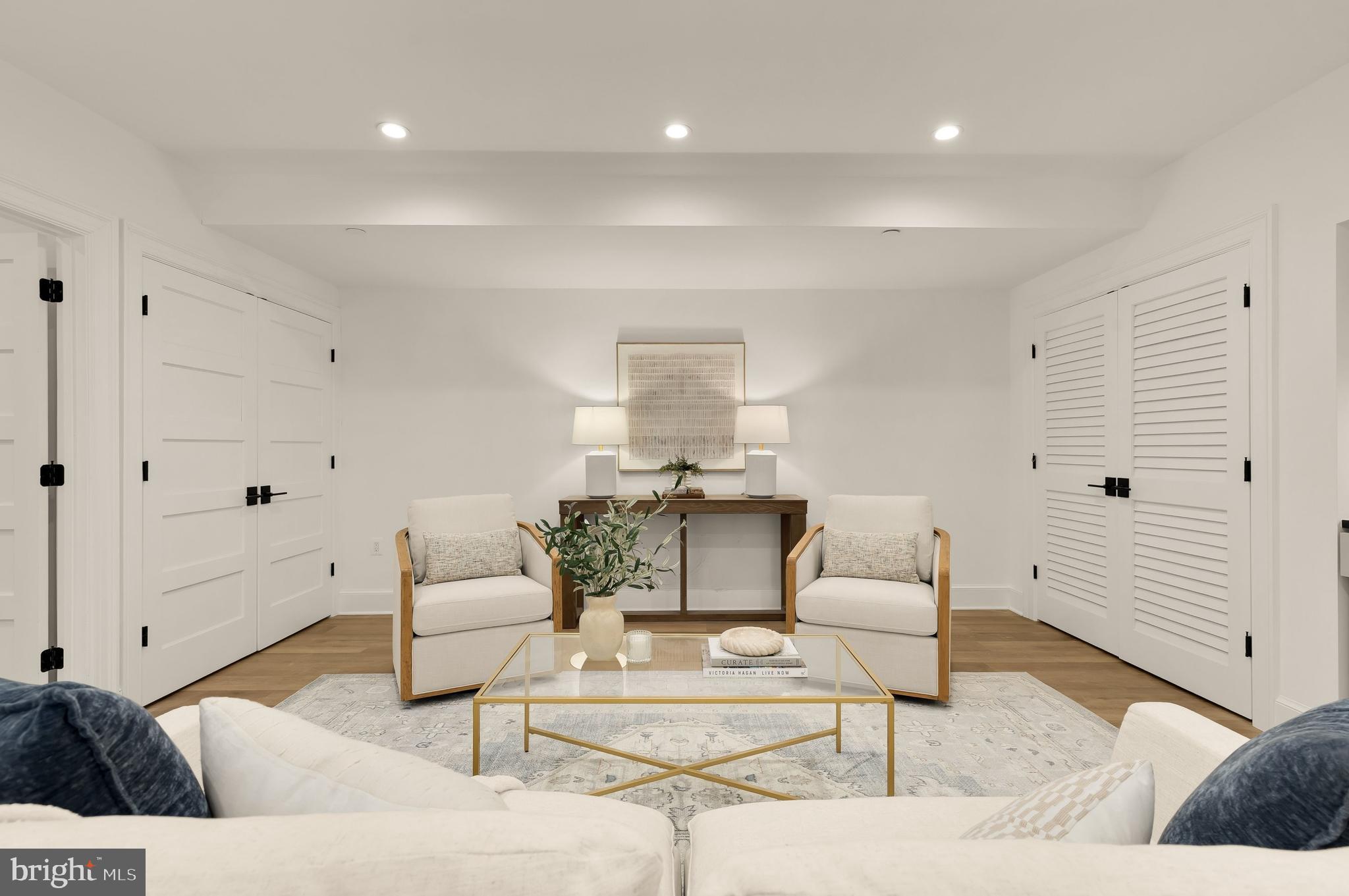 1249 4th Street Northwest Washington, DC 20001 - Photo 27 of 32 a living room with furniture and white walls