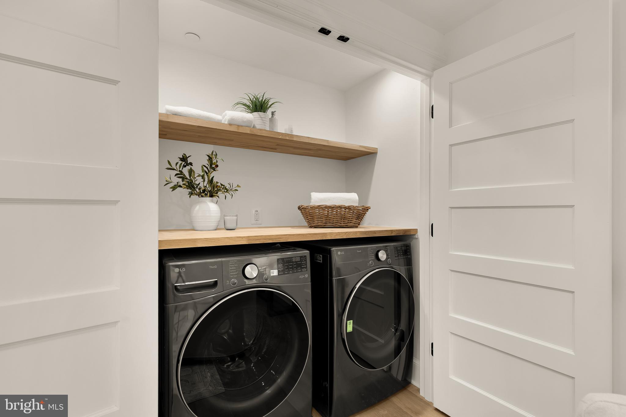 1249 4th Street Northwest Washington, DC 20001 - Photo 30 of 32 a view of washer and dryer in a utility room