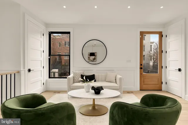 a bed room with a bed furniture and a large window