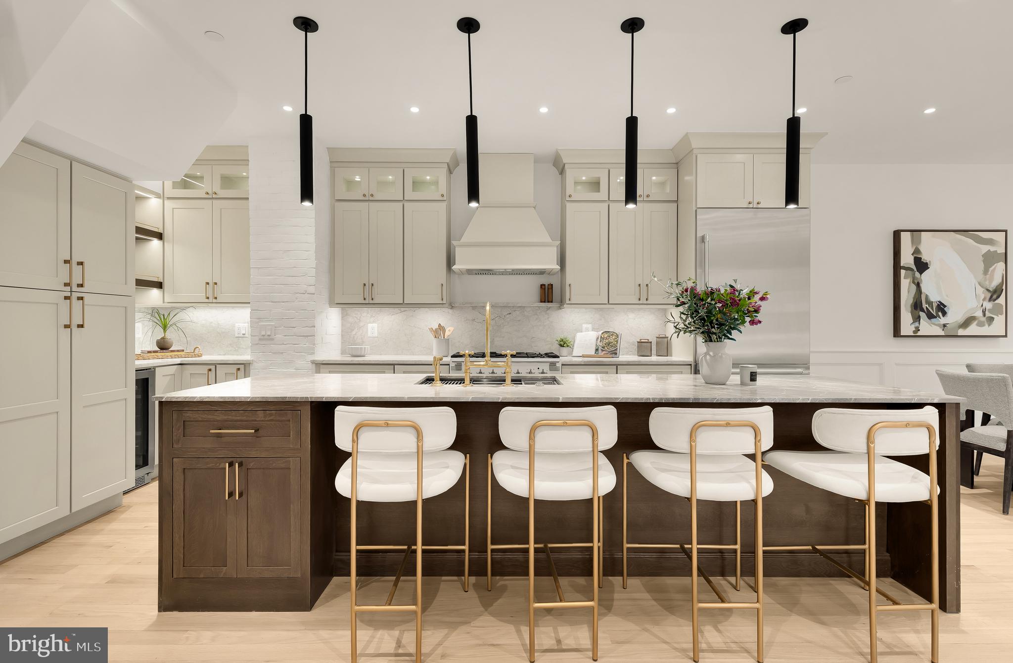 1249 4th Street Northwest Washington, DC 20001 - Photo 10 of 32 a dining table chairs and a chandelier