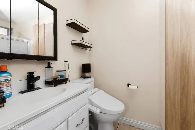a bathroom with a sink and toilet