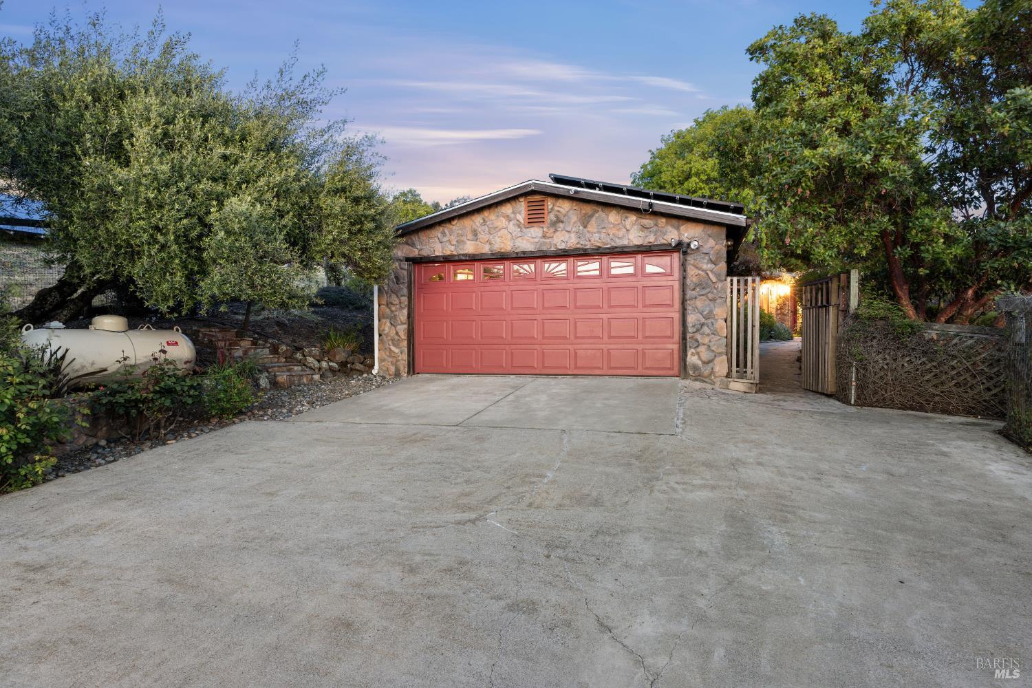 6960 Round Oak Road Penngrove, CA 94951 - Photo 7 of 58 a view of an empty room with a yard