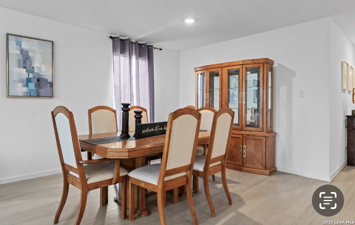 3849 High Tide Seguin, TX 78155 - Photo 4 of 15 a view of a dining room with furniture and window