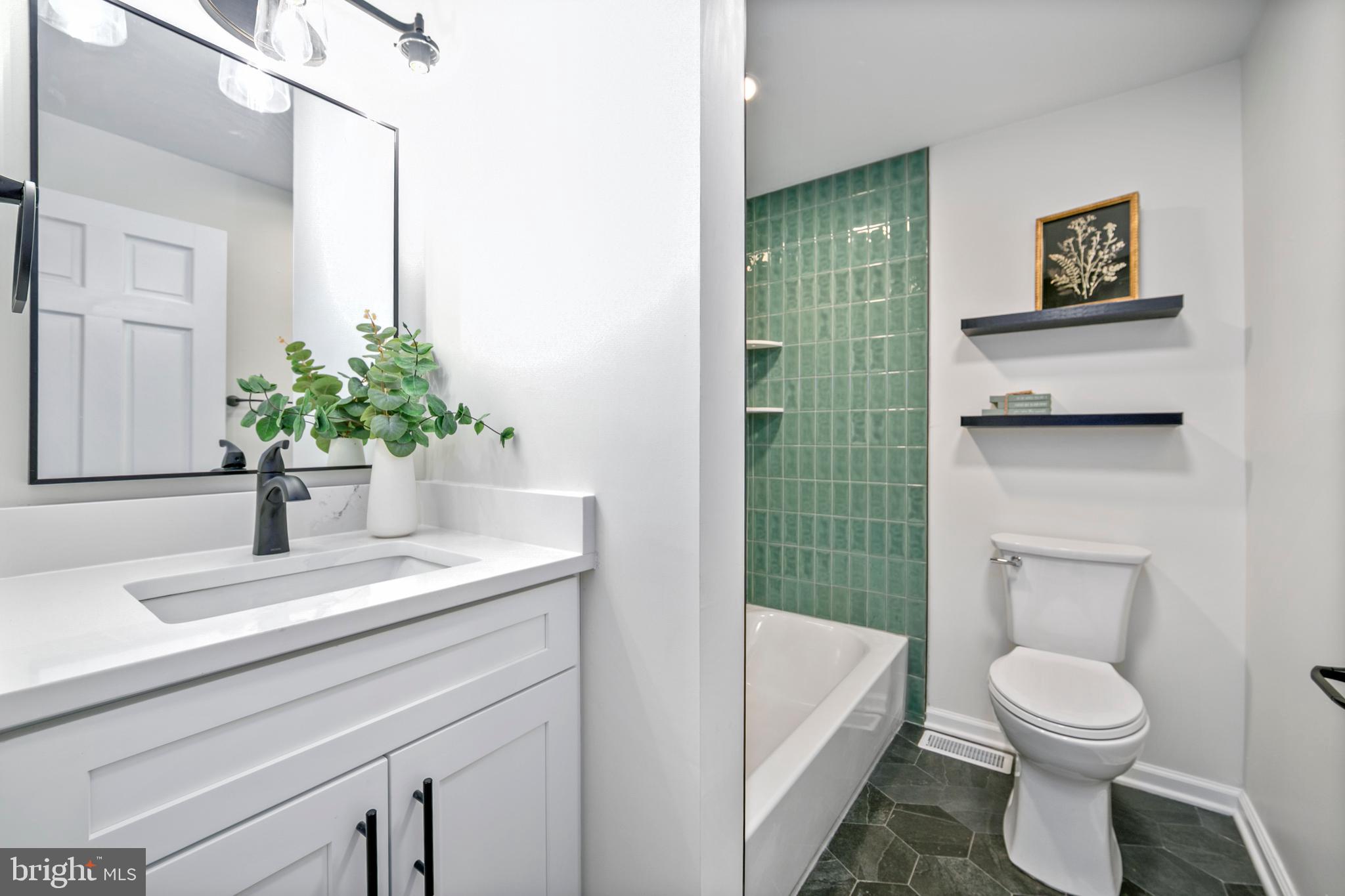 308 Farmdale Road Moorestown, NJ 08057 - Photo 13 of 47 a bathroom with a sink a toilet and shower