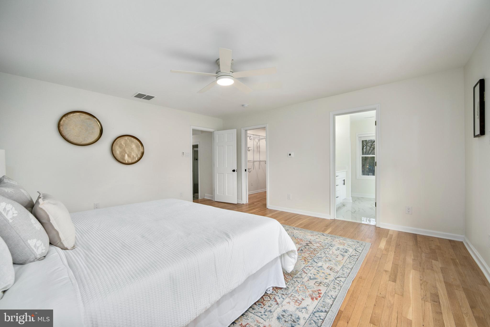 308 Farmdale Road Moorestown, NJ 08057 - Photo 18 of 47 a bedroom with a bed and a chandelier