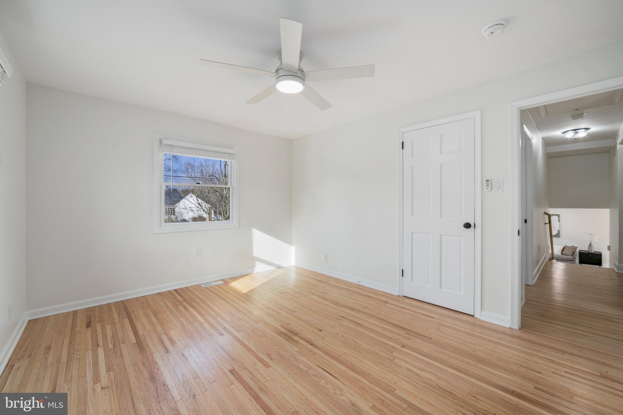 308 Farmdale Road Moorestown, NJ 08057 - Photo 28 of 47 a view of an empty room with wooden floor