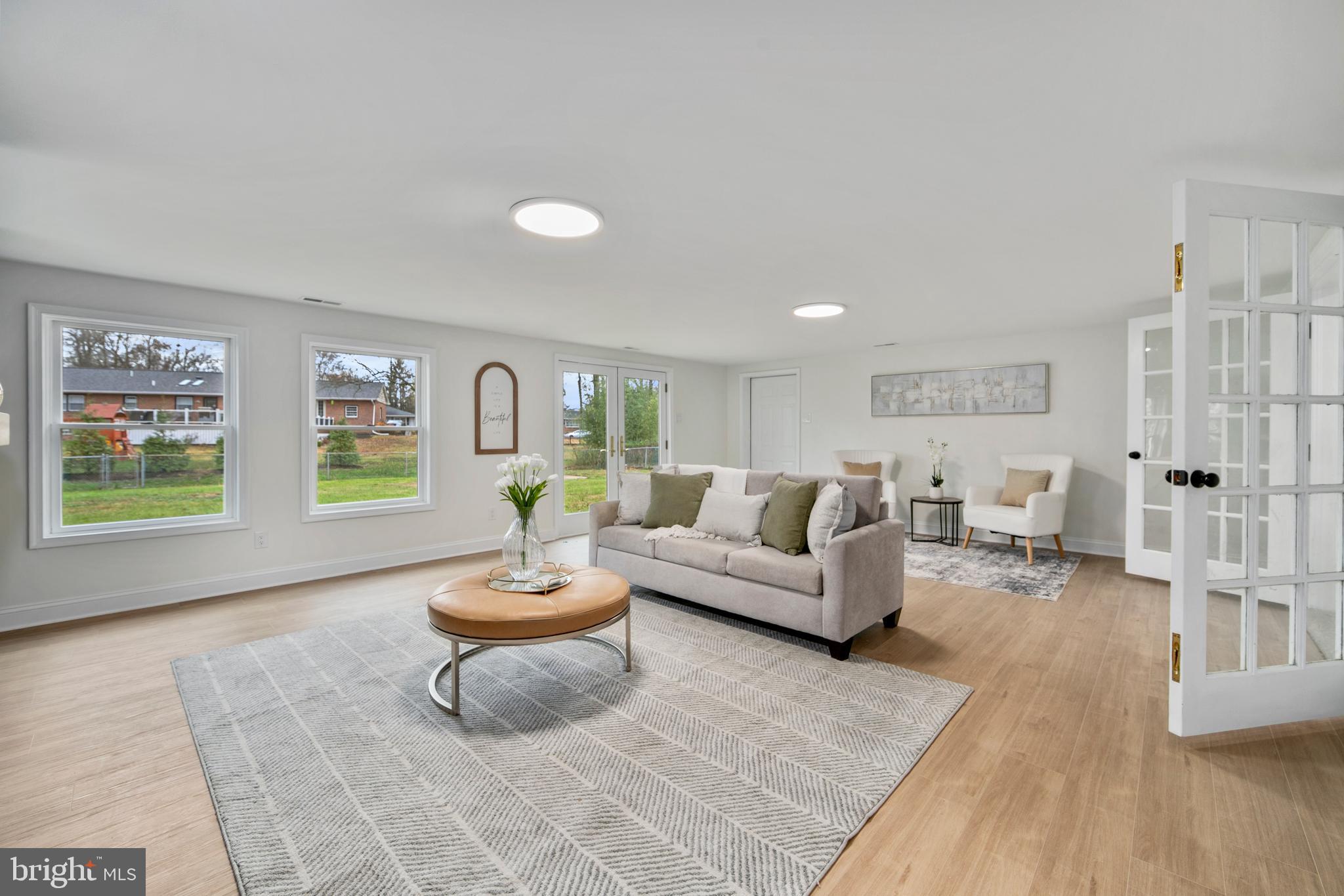 308 Farmdale Road Moorestown, NJ 08057 - Photo 34 of 47 a living room with furniture and a wooden floor