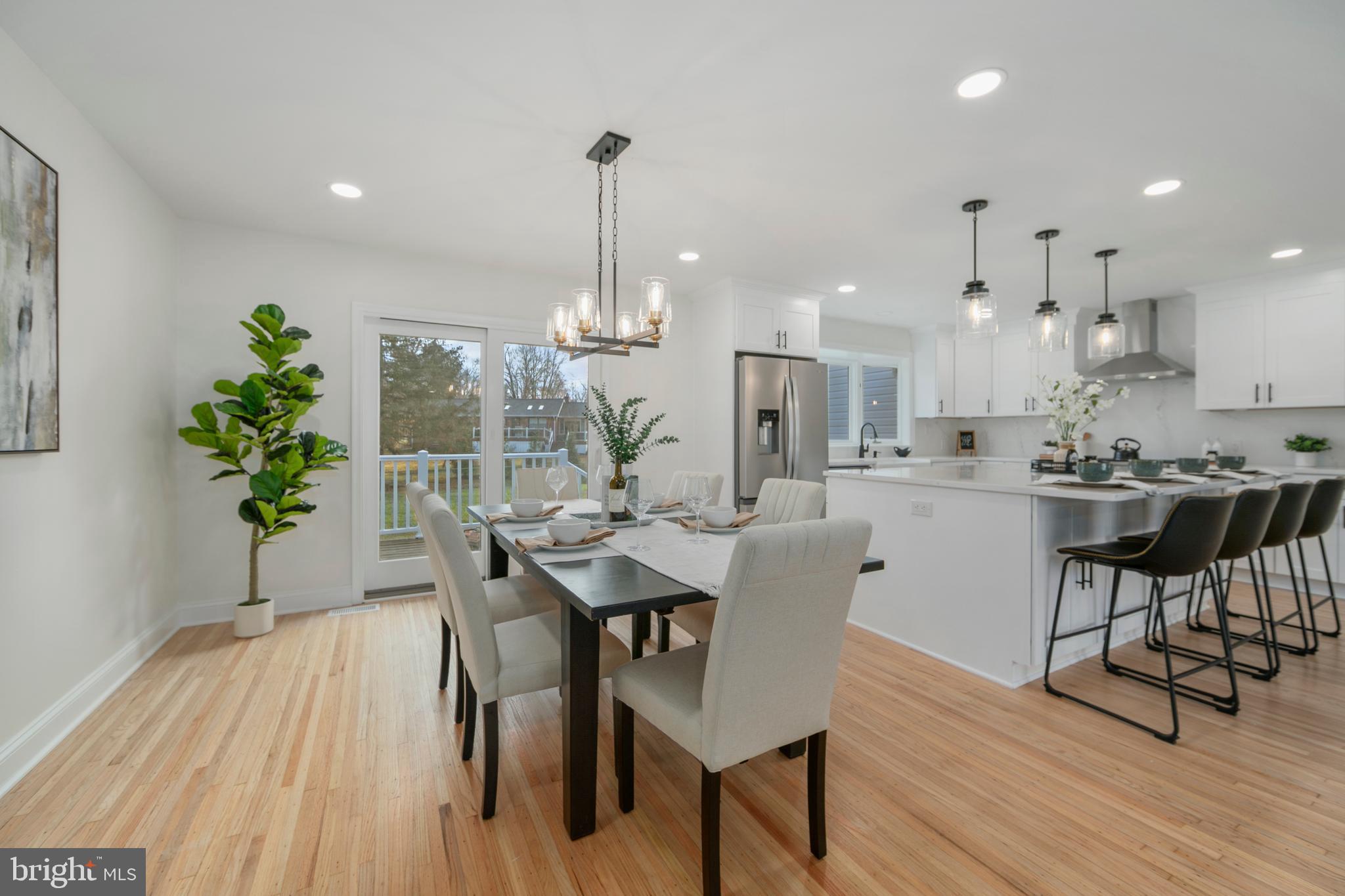 308 Farmdale Road Moorestown, NJ 08057 - Photo 7 of 47 a view of a dining room with furniture and wooden floor