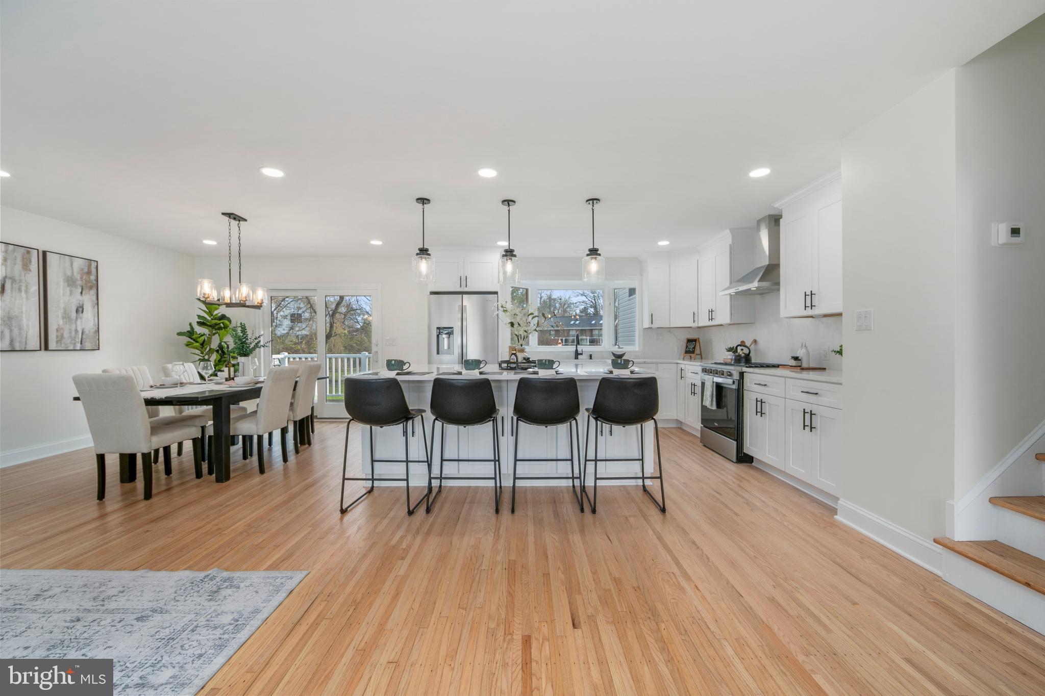 308 Farmdale Road Moorestown, NJ 08057 - Photo 10 of 47 a view of a dining room with furniture and wooden floor