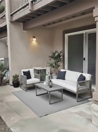 a building outdoor space with patio furniture