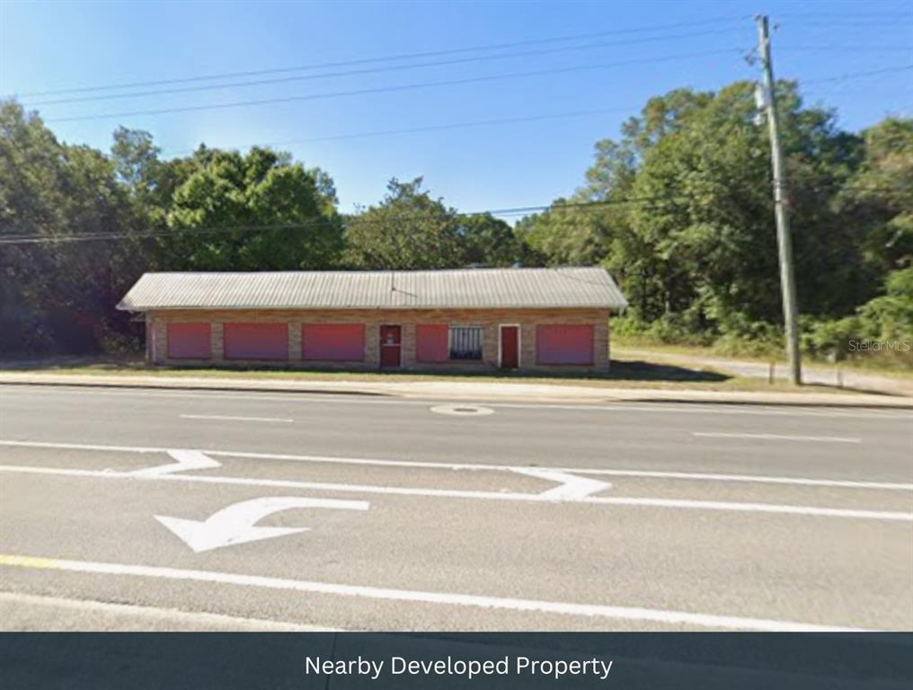 Julia Drive Milton, FL 32570 - Photo 5 of 21 a view of a houses from a yard