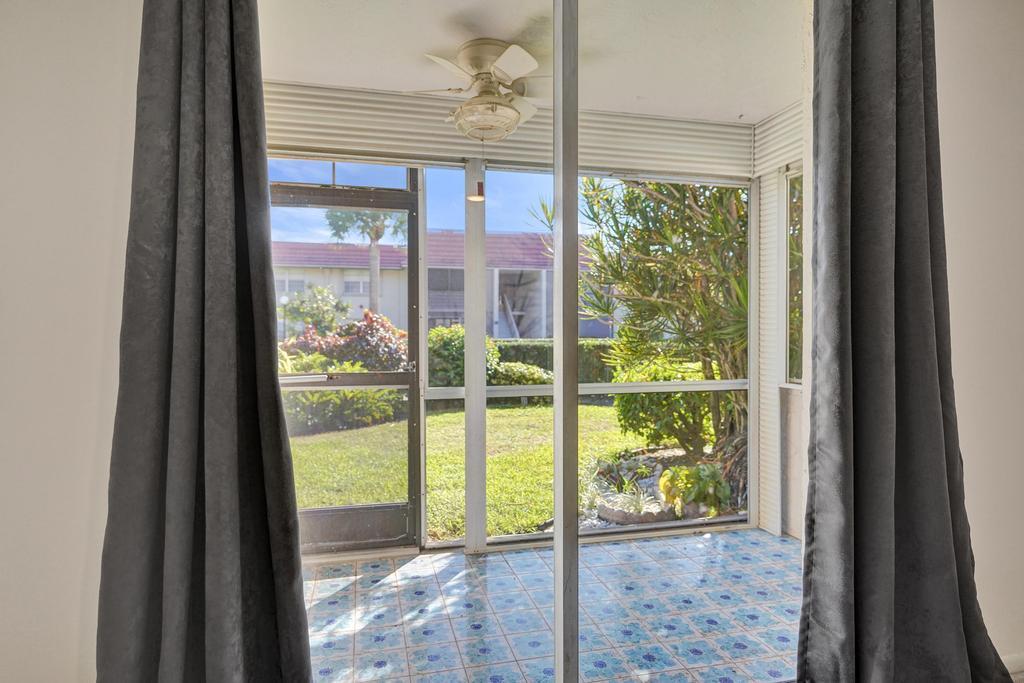 1050 Northwest 13th Street, Unit 193D Boca Raton, FL 33486 - Photo 28 of 55 a view of a glass door