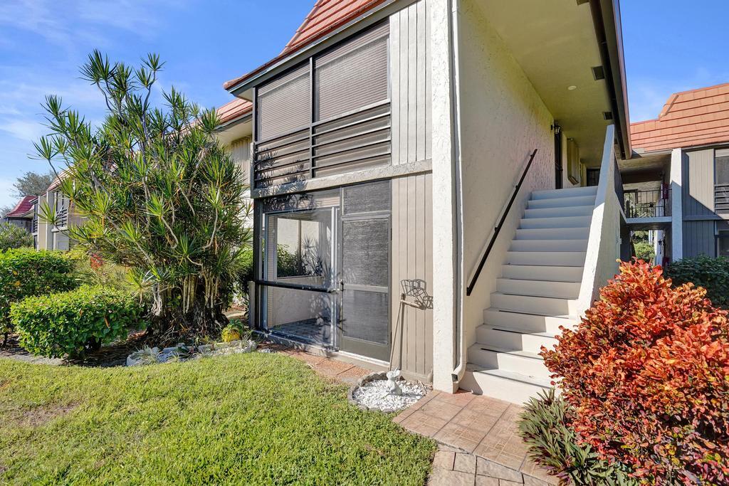 1050 Northwest 13th Street, Unit 193D Boca Raton, FL 33486 - Photo 34 of 55 a house view with a outdoor space