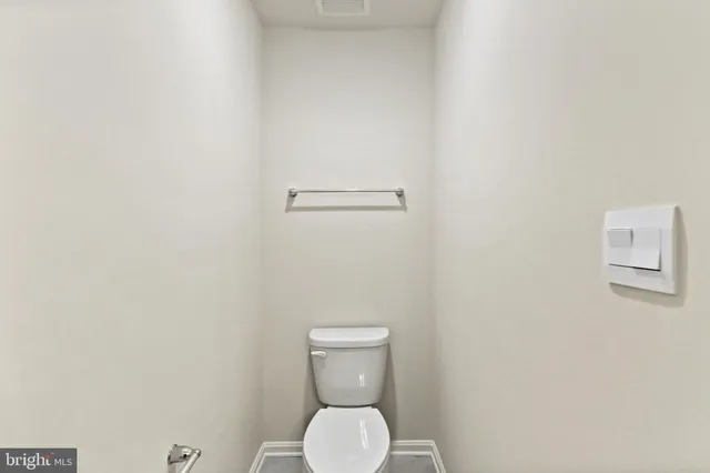 a bathroom with a toilet