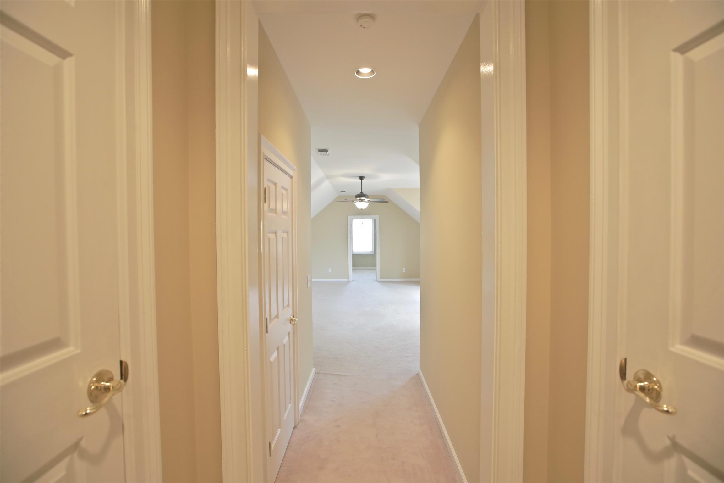 1734 Stop 30 Road Hendersonville, TN 37075 - Photo 20 of 30 Hallway to Bonus Room. Large closets for extra storage