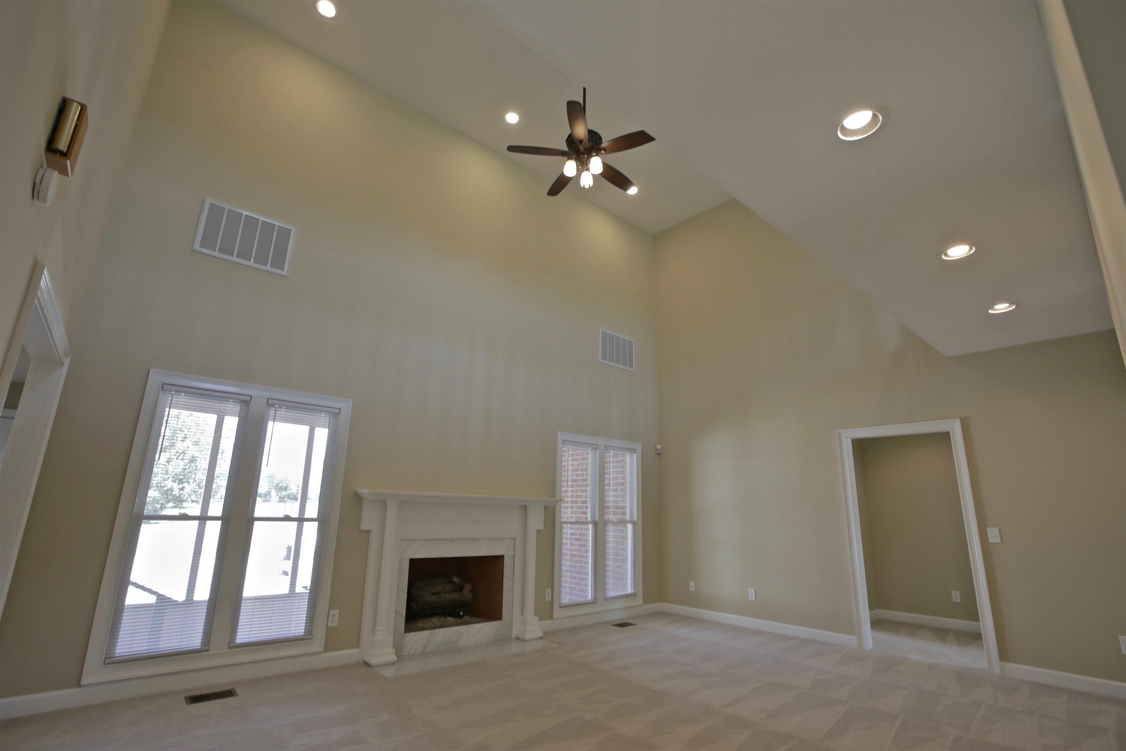 1734 Stop 30 Road Hendersonville, TN 37075 - Photo 7 of 30 Great Room featuring gas fireplace and lots of natural light
