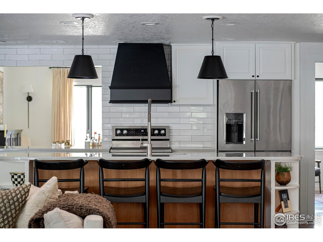 7204 Rustic Trail Boulder, CO 80301 - Photo 2 of 40 The kitchen island is the center piece of the main living area and is the perfect place to gather