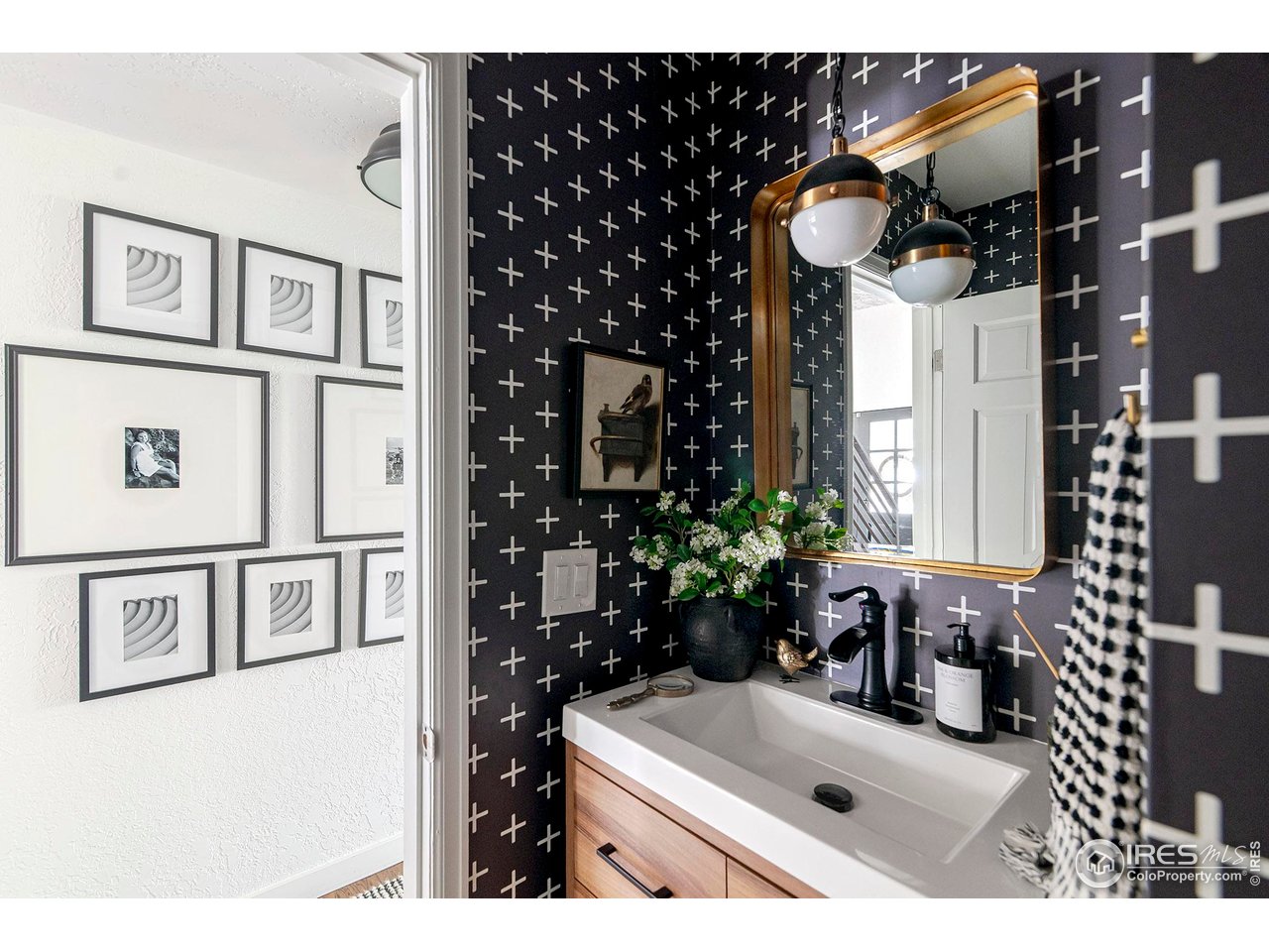 7204 Rustic Trail Boulder, CO 80301 - Photo 21 of 40 Main level powder room with stylish wallpaper