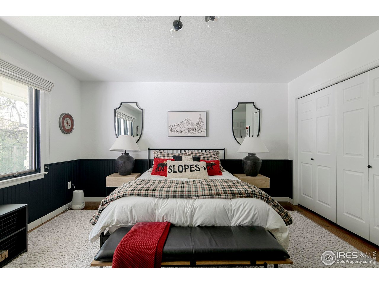 7204 Rustic Trail Boulder, CO 80301 - Photo 30 of 40 Secondary bedroom 3 is very large with wall to wall closets and hardwood floors