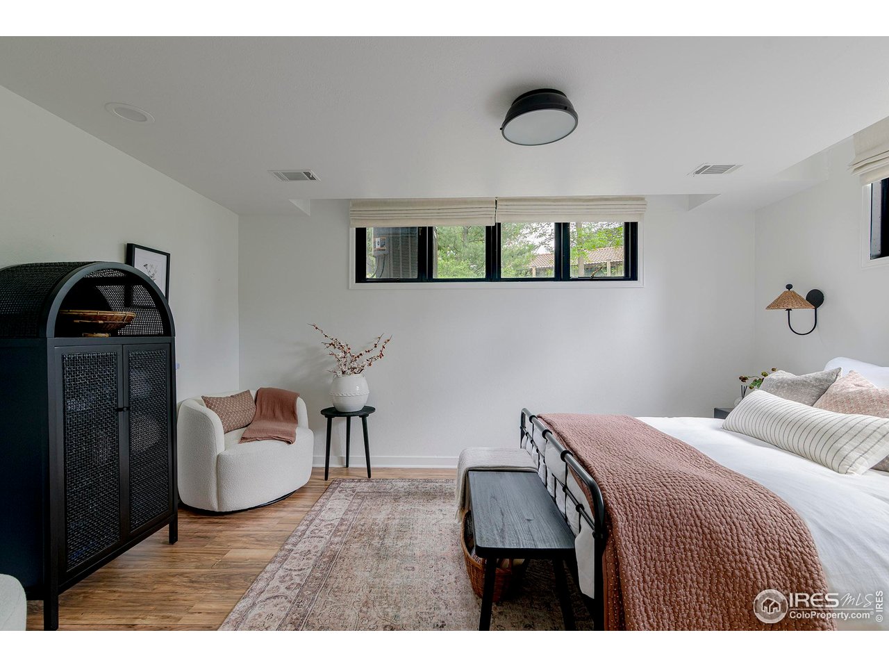 7204 Rustic Trail Boulder, CO 80301 - Photo 33 of 40 Lower level bedroom with garden level windows.