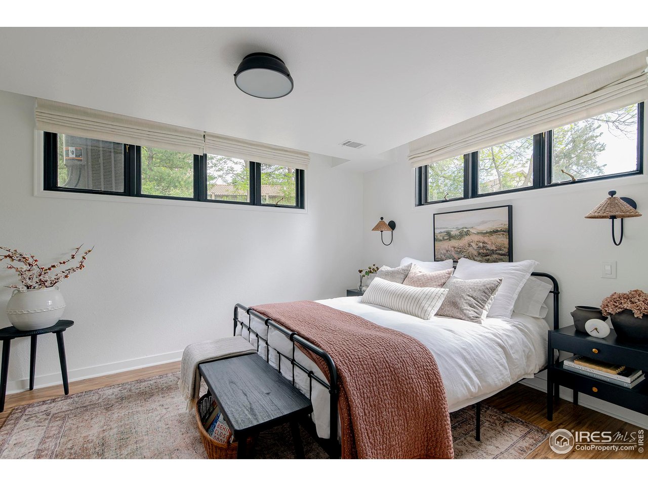 7204 Rustic Trail Boulder, CO 80301 - Photo 34 of 40 Secondary bedroom 4 in the lower garden level is bathed in natural light and has an adjacent bathroom