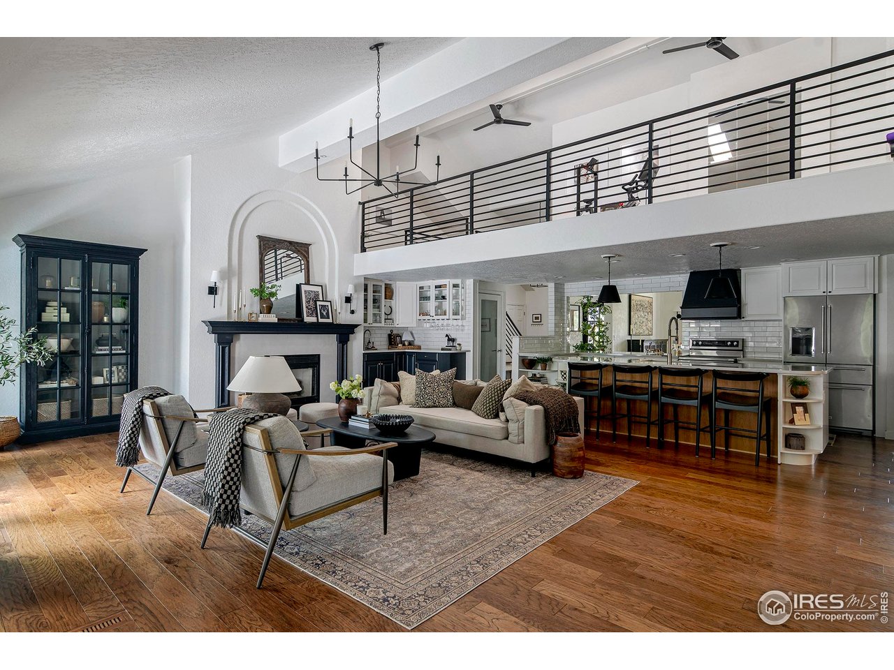 7204 Rustic Trail Boulder, CO 80301 - Photo 4 of 40 The grand main floor has vaulted ceilings, open sight lines, a terrific connection to the outdoor areas and is perfect for entertaining