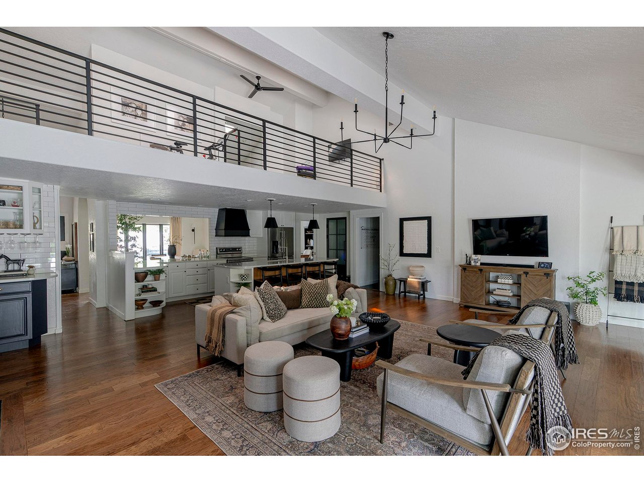 7204 Rustic Trail Boulder, CO 80301 - Photo 7 of 40 The main level living area is connected to the kitchen and outdoor areas as well as the dining room